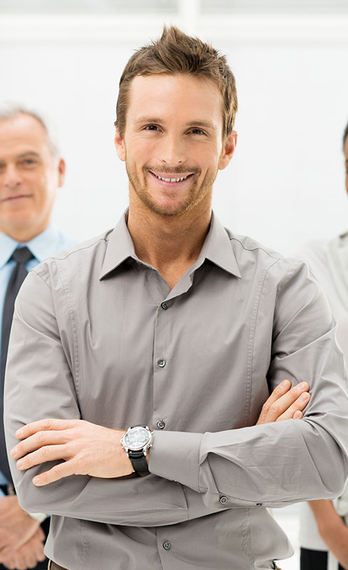 Businessman standing with arms crossed